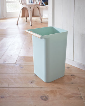 Side view of blue Trash Can by Yamazaki Home. view 8