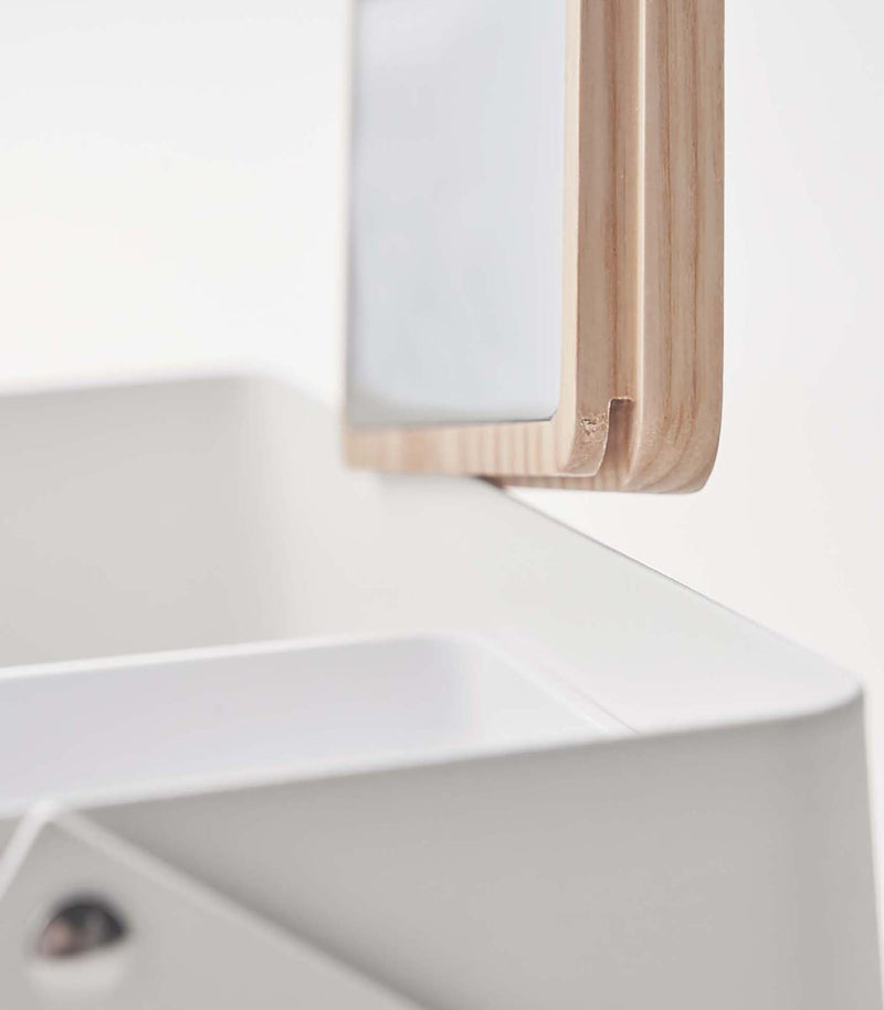 Close up view of white Makeup Organizer with lid open on white background by Yamazaki Home.
