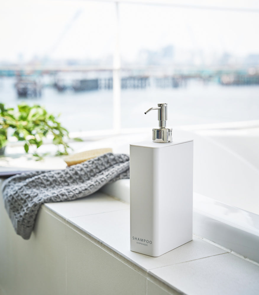 View 4 - White Shampoo Dispenser in bathroom by Yamazaki Home.