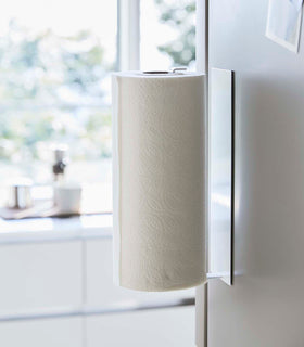 Side view White Magnetic Paper Towel Holder by Yamazaki Home. view 5