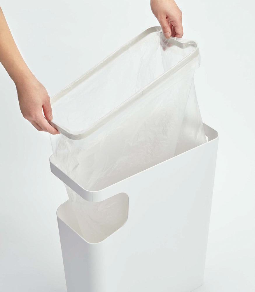 View 5 - White Side Table Trash Can with plastic bag on white background by Yamazaki Home.