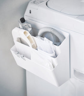 White Magnetic Storage Caddy containing cleaning items in laundry room by Yamazaki Home. view 3