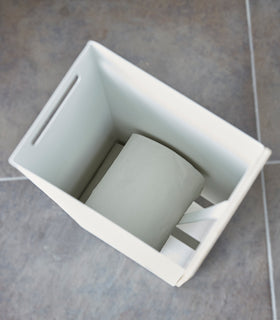 Aerial view of white Toilet Paper Stocker without cover holding toilet paper rolls by Yamazaki home. view 6