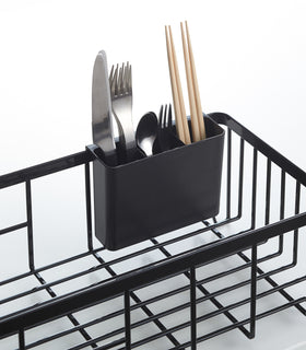 Close up of black Dish Rack utensil organizer on white background by Yamazaki Home. view 13