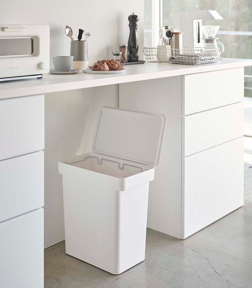 View 3 - Open white Rolling Trash Can in the kitchen by Yamazaki Home.