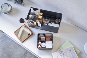 Aerial view of open black Makeup Organizer holding makeup products by Yamazaki Home. view 12