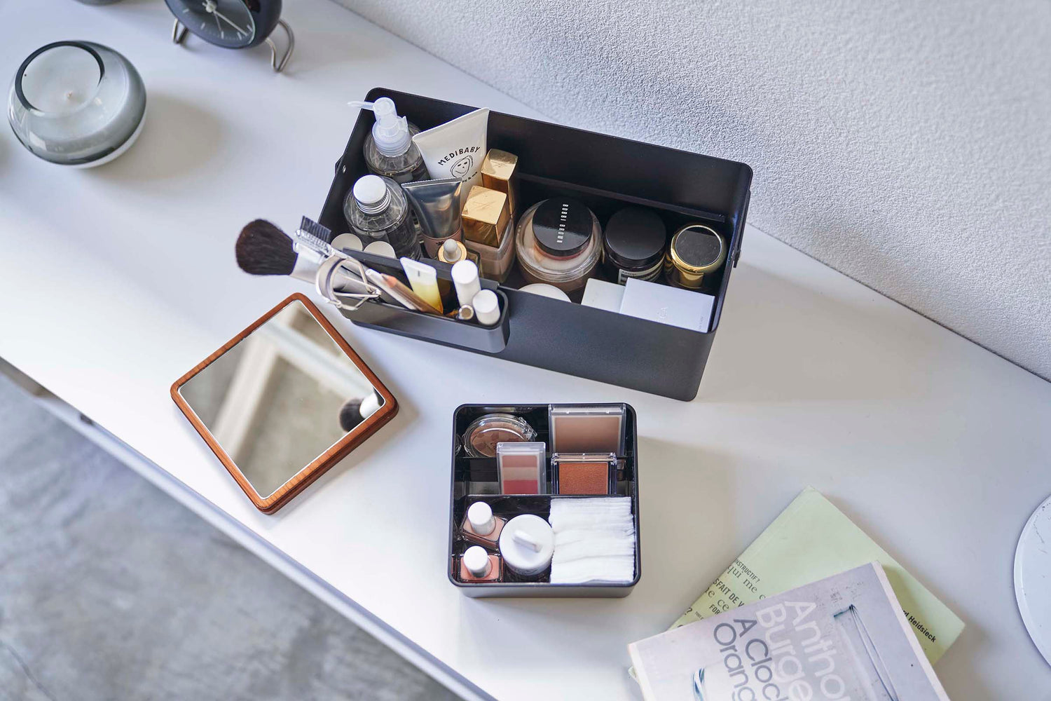 View 12 - Aerial view of open black Makeup Organizer holding makeup products by Yamazaki Home.