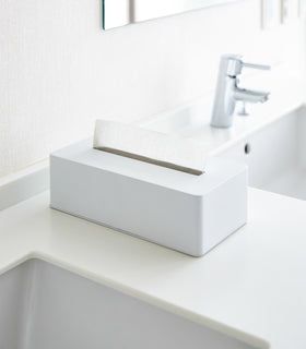 White Tissue Case on bathroom sink countertop by Yamazaki Home. view 2