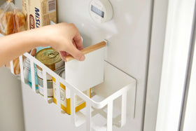 Side view of white Magnetic Storage Basket with wood-top divider insert by Yamazaki Home. view 7