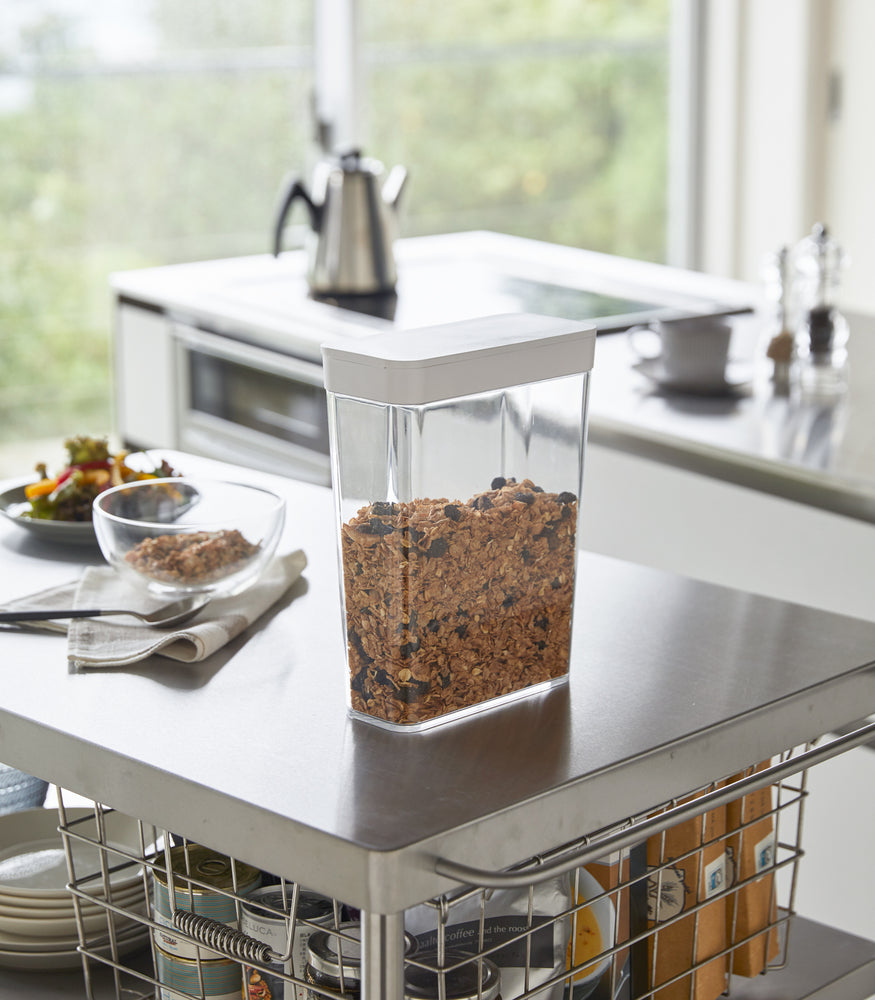 View 3 - White Storage Container holding cereal on kitchen countertop by Yamazaki Home.