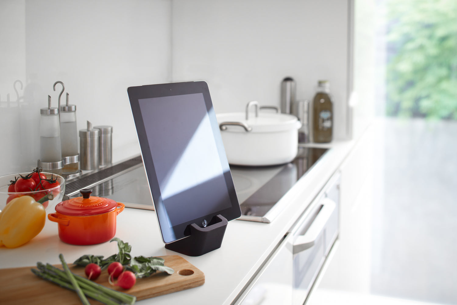 View 7 - Side view of black Tablet Stand holding tablet in kitchen by Yamazaki Home.