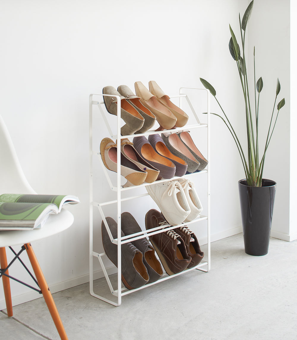 White Shoe Rack holding heels and sneakers by Yamazaki home.