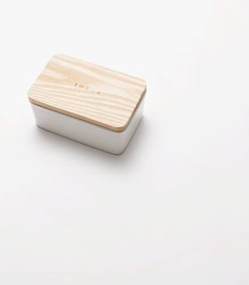 Product GIF showing Ceramic Butter Dish with various props. view 2