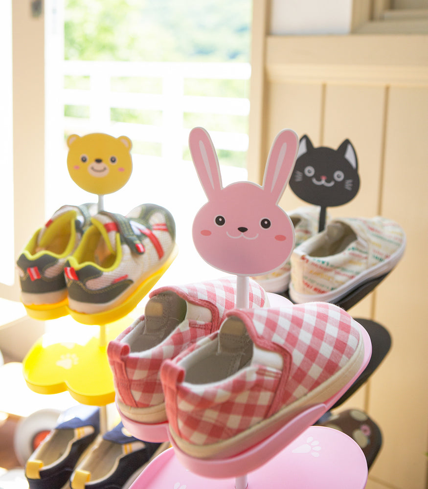 View 3 - Close up of pink Kids' Shoe Rack by Yamazaki Home.