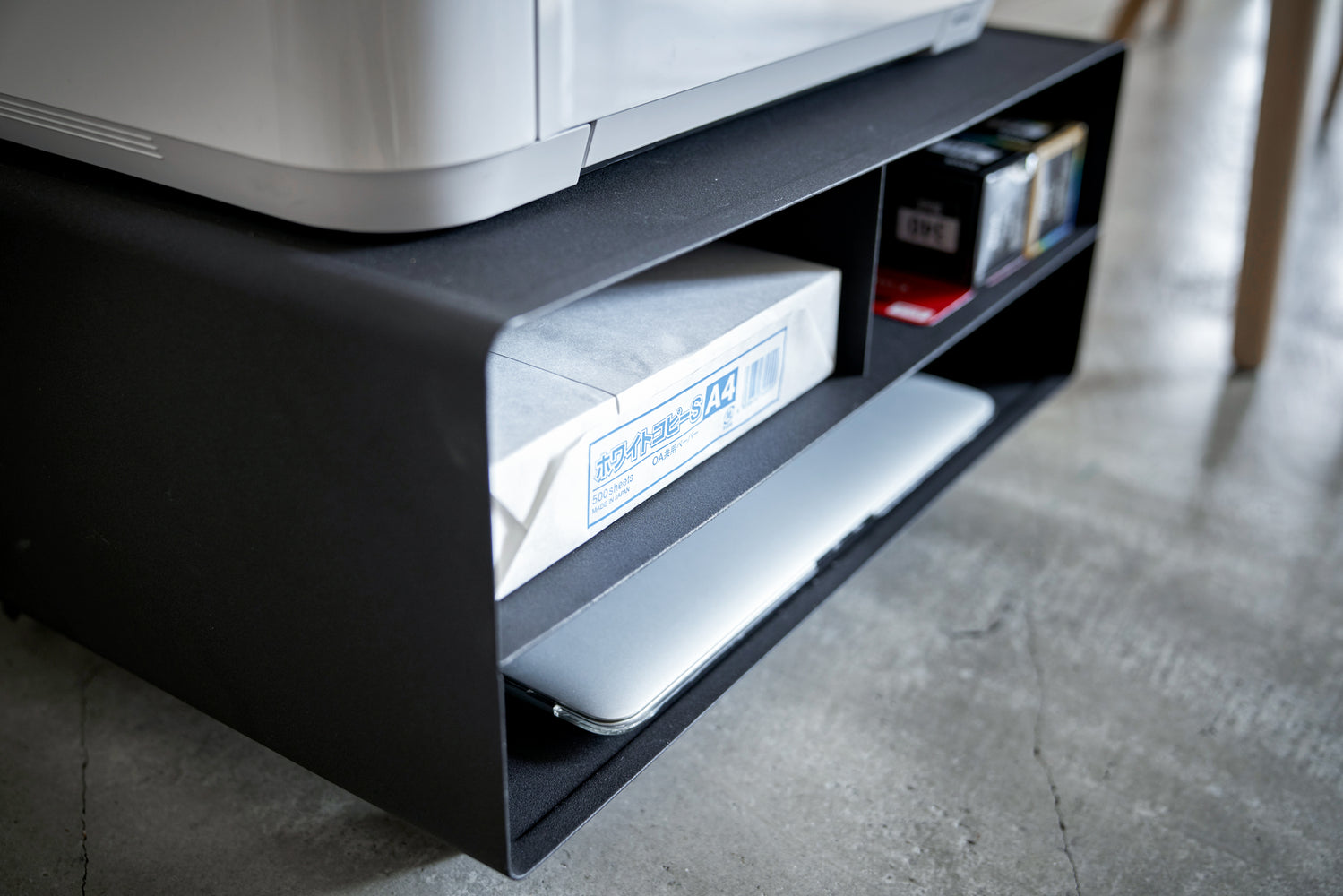 View 9 - Close up angled view of black Rolling Printer Stand storage compartments by Yamazaki Home.