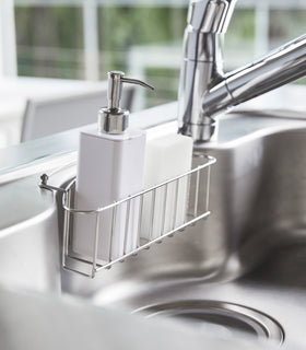 White Hand Soap Dispenser in sink tray in kitchen sink by Yamazaki Home. view 4