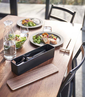 Black Utensil Case holding utensils on dining table by Yamazaki Home. view 11