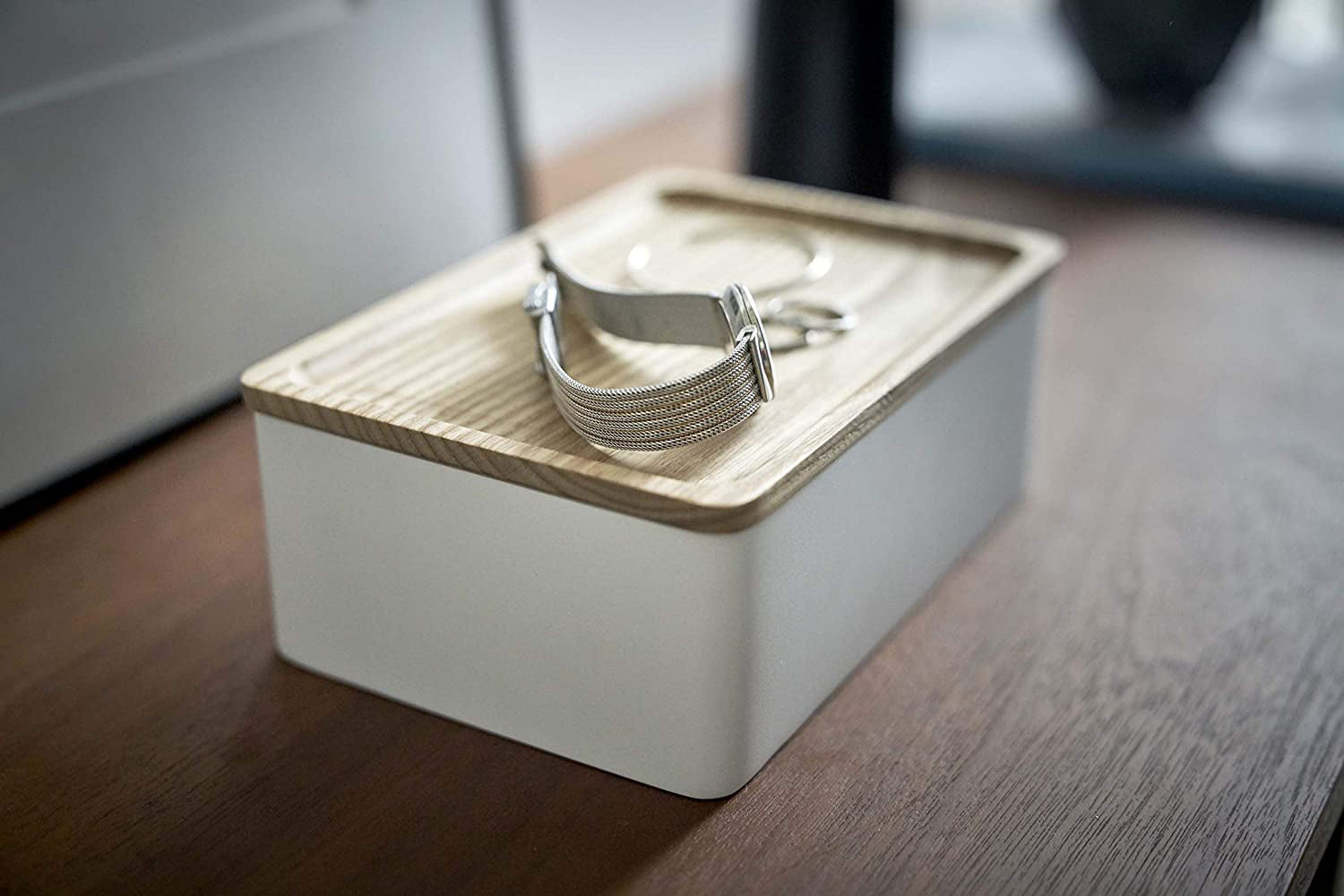 View 7 - Side view of white Accessory Box with Wood Lid holding watch and jewelry by Yamazaki Home.