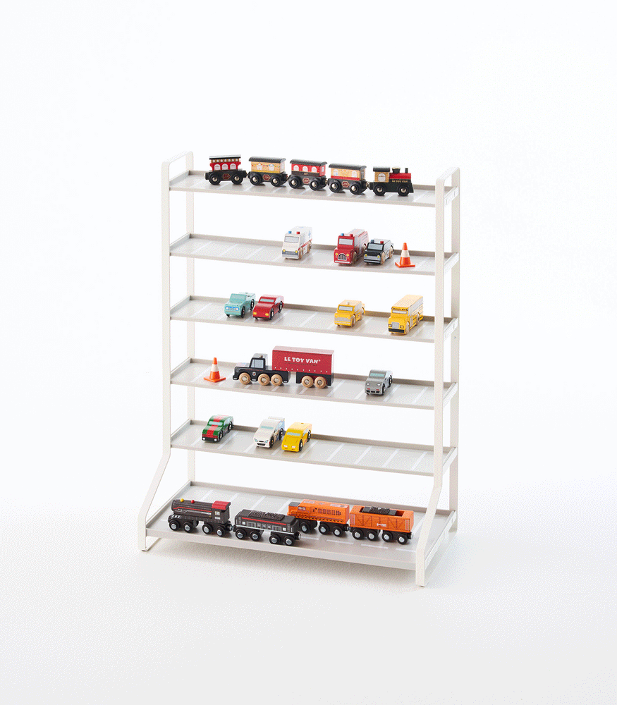 View 7 - Product GIF showing Kids' Parking Garage with various props.