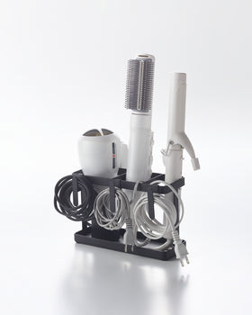 Prop photo showing Haircare Appliance Holder with various props. view 7