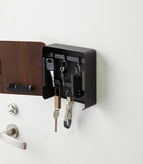 Open Black Square Magnetic Key Cabinet holding keys by Yamazaki Home. view 10