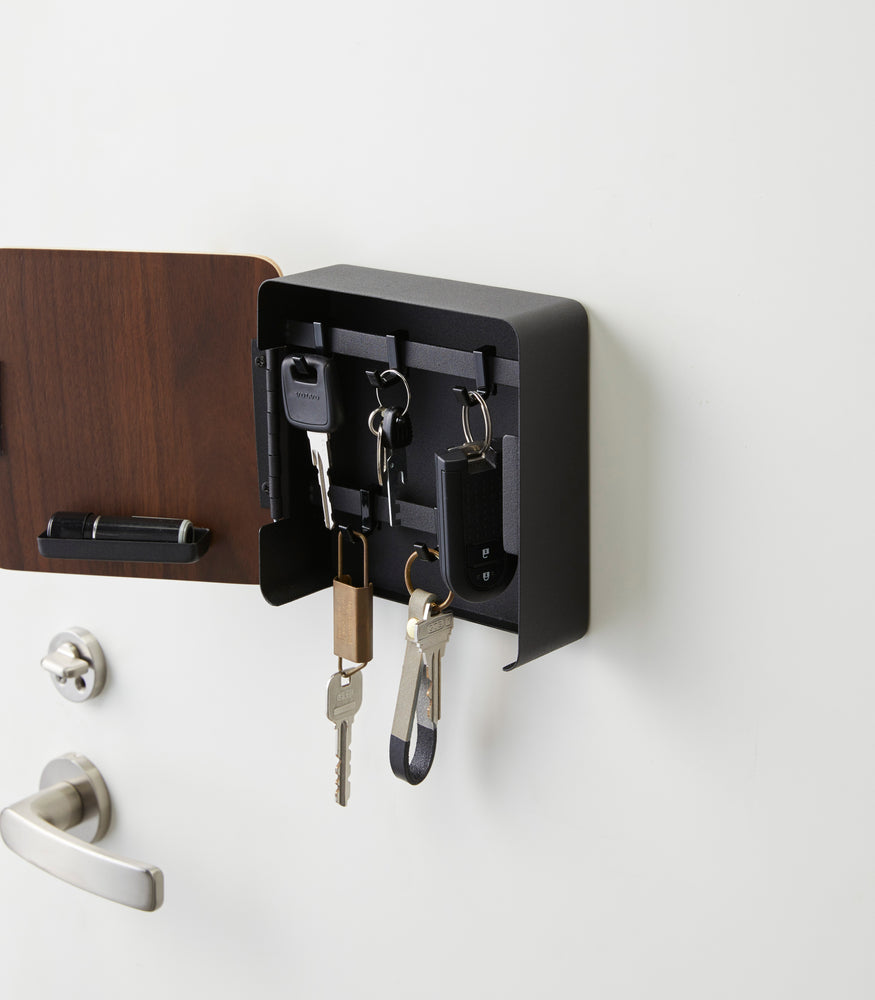 View 10 - Open Black Square Magnetic Key Cabinet holding keys by Yamazaki Home.