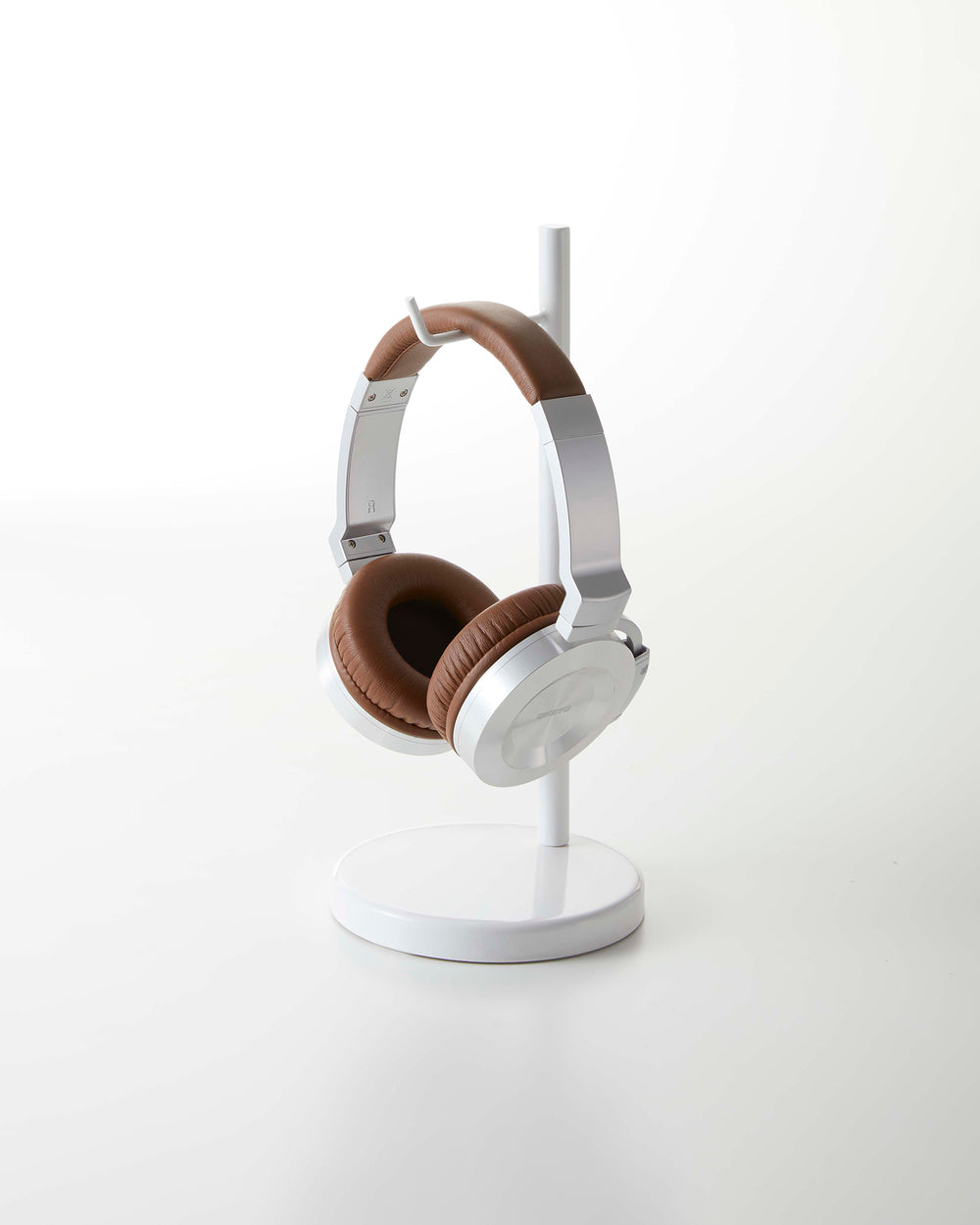 Prop photo showing Headphone Stand with various props.