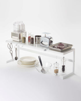 Prop photo showing Expandable Countertop Shelf with various props. view 2