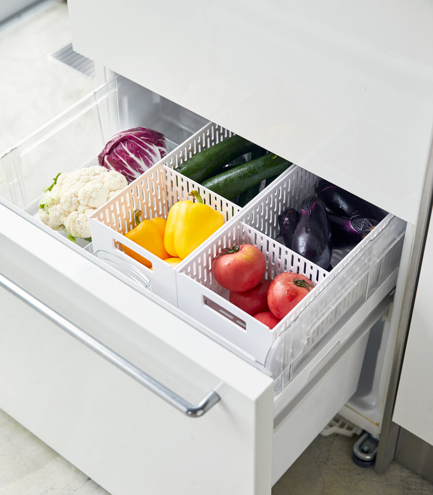 View 6 - Aerial view of white Stackable Vegetable Stockers holding fresh vegetables in kitchen fridge by Yamazaki Home.