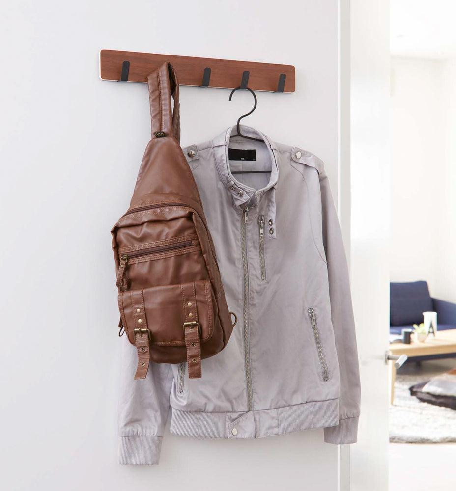 View 7 - Over-the-Door Hanger holding bag and jacket by Yamazaki Home.