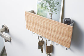 Close up aerial view of ash Magnetic Key Rack with Tray holding keys by Yamazaki Home. view 4