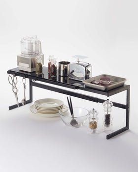 Prop photo showing Expandable Countertop Shelf with various props. view 12