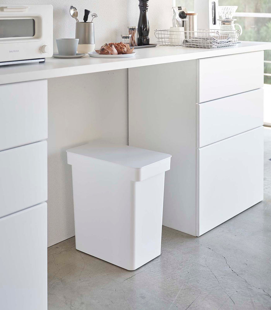 View 2 - White Rolling Trash Can in the kitchen by Yamazaki Home.