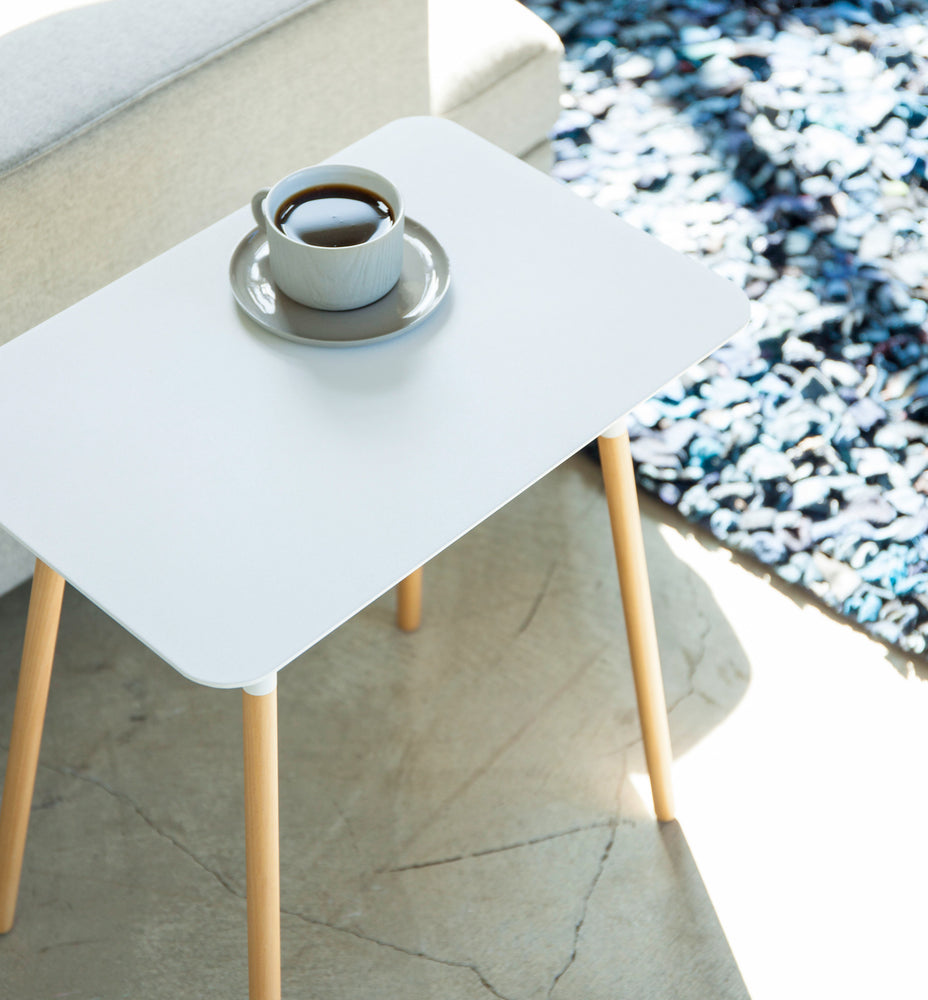 View 3 - Aerial view of white Side Table displaying coffee cup by Yamazaki Home.