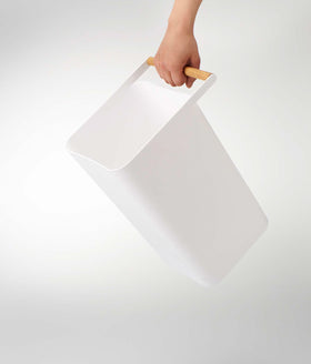 White Trash Can held by handle on white background by Yamazaki Home. view 5