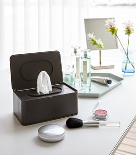Black Wet Tissue Case on vanity countertop by Yamazaki Home. view 8