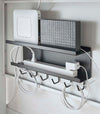 Black Wall-Mount Cable and Router Storage Rack holding routers and power cord by Yamazaki Home.