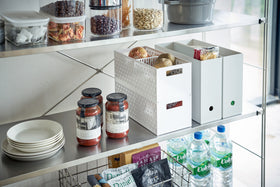 White Stackable Vegetable Stockers stacked and holding food items on kitchen pantry shelf by Yamazaki Home. view 4