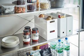 White Stackable Vegetable Stockers stacked and holding food items on kitchen pantry shelf by Yamazaki Home. view 3
