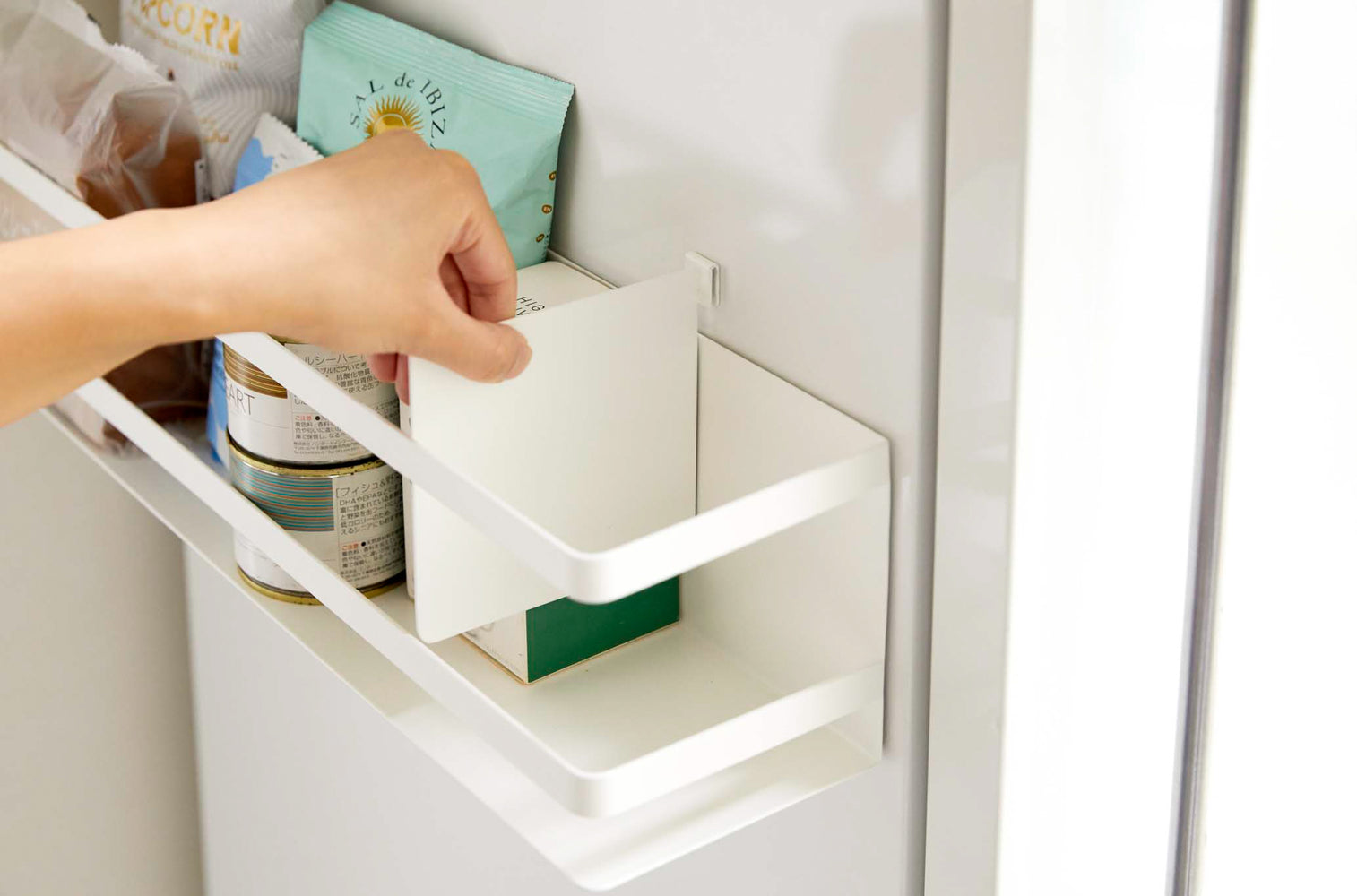 View 5 - Aerial view of white Magnetic Storage Basket white divider insert by Yamazaki Home.