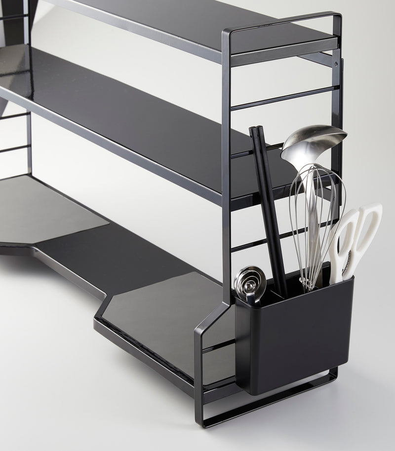 Front view of stacked white Stackable Shoe Rack by Yamazaki Home.