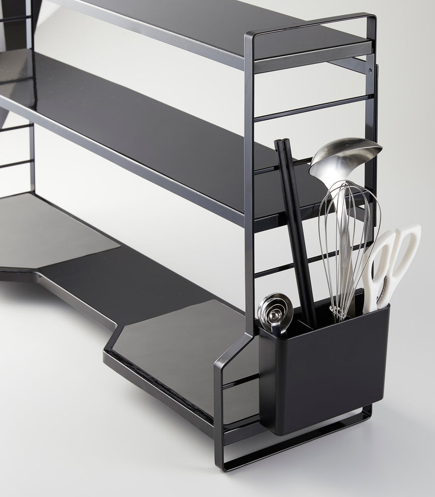 View 9 - Front view of stacked white Stackable Shoe Rack by Yamazaki Home.