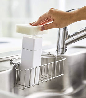 White One-Handed Push Soap Dispenser in kitchen sink by Yamazaki Home. view 2