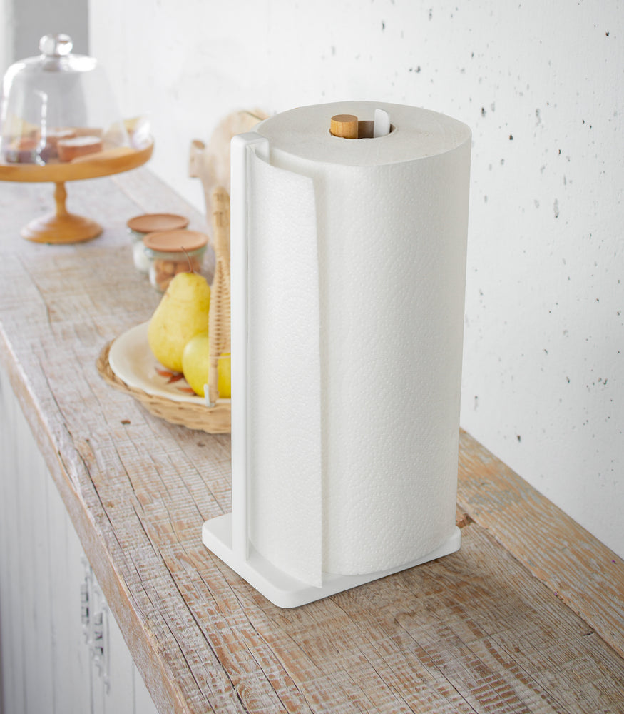 View 4 - Paper Towel Holder holding paper towel on kitchen shelf by Yamazaki Home.