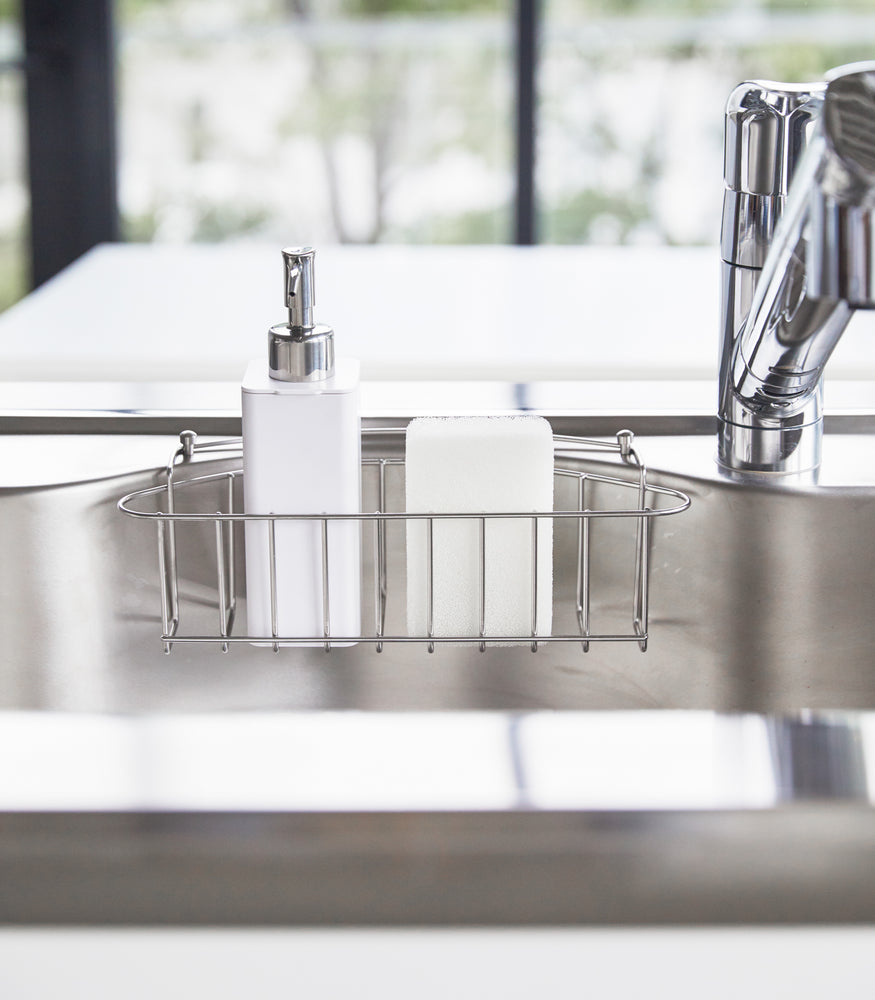 View 5 - Front view of white Hand Soap Dispenser in kitchen sink by Yamazaki Home.