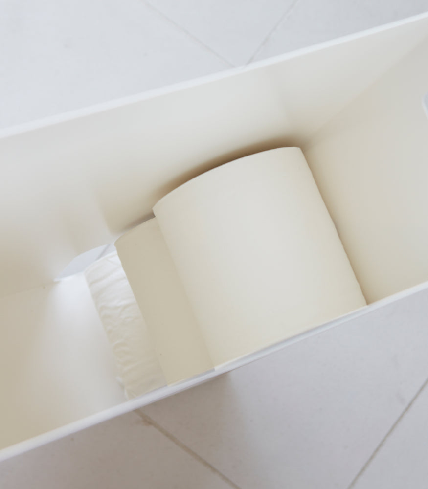 View 5 - Aerial view inside white Toilet Paper Stocker holding toilet paper rolls by Yamazaki Home.
