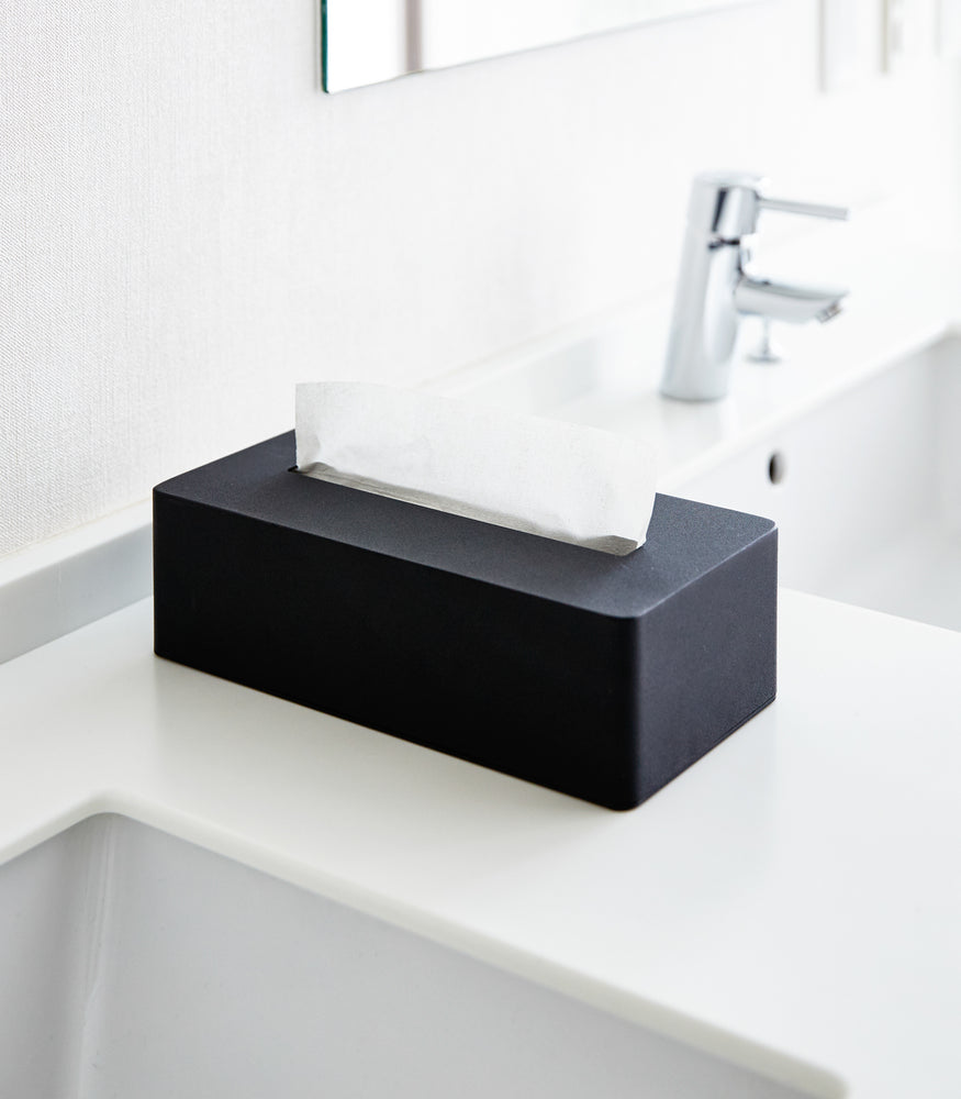 View 7 - Black Tissue Case on bathroom sink countertop by Yamazaki Home.