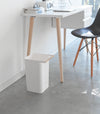 Side view of white Trash Can in office space by Yamazaki Home.