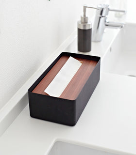 Aerial view of black Tissue Case on bathroom sink counter by Yamazaki Home. view 7