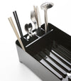 Aeriel view of black Dish Rack holding utensils on white backround by Yamazaki Home.